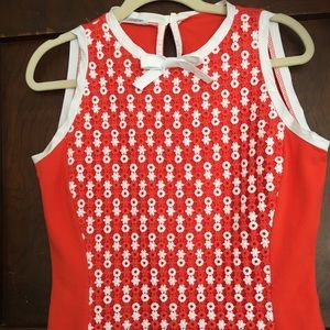 Adorable orange eyelet top